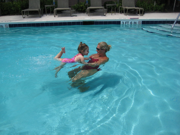 Alyss gives a swim lesson